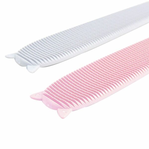 A pink and grey cat combs next to each other